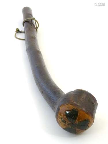 An early 20thC folk art carved Irish blackthorn Shillelagh club, with painted shamrock to the knop,