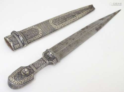 A Russian knife and scabbard,