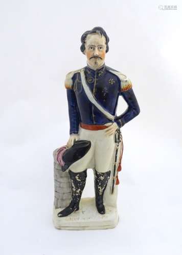 A large Victorian Staffordshire pottery portrait figure depicting Louis Napoleon. Titled to base.