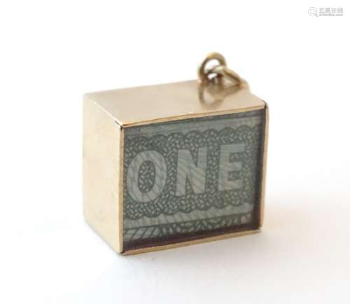 A vintage 9ct gold charm titled In Emergency Break Glass,