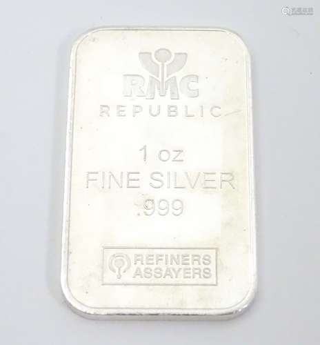 A late 20thC bullion bar of 999 grade silver.