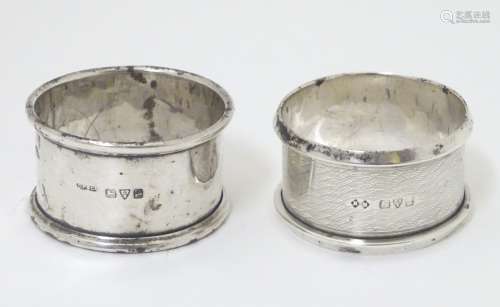 An Art Deco silver napkin ring with engine turned decoration, hallmarked Chester 1922,