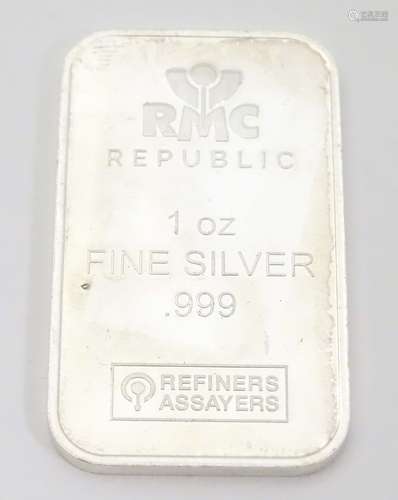 A late 20thC bullion bar of 999 grade silver.