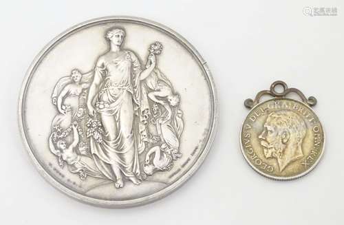 A silver plate Royal Horticultural Society medallion dated 1911 2 1/4