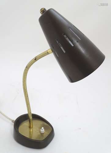 A 20thC Pifco model 971 desk lamp, the base and shade with bronzed finish, with adjustable arm.