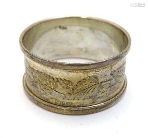 A silver napkin ring hallmarked Birmingham 1973 maker Henry Griffith & Sons.