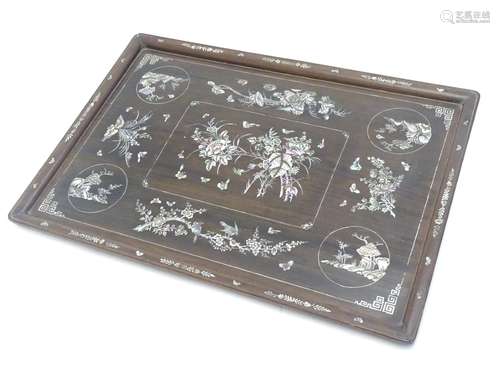 A late 19th / early 20thC Chinese rosewood tray with abalone inlay flowers, butterflies, birds,