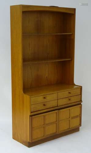 A mid / late 20thC teak wallboard dresser unit by Nathan Furniture,