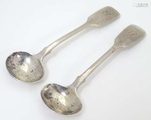 A pair of Victorian silver fiddle pattern mustard spoons, hallmarked Exeter 1853,