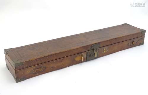 A Continental mid 20thC brown embossed leather gun motor case,