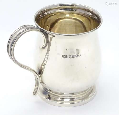 A silver Christening cup hallmarked Sheffield 1934 maker Atkin Brothers with Silver Jubilee mark.