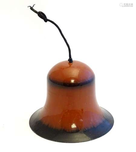 A Vintage retro pendant light, the exterior with brown and black finish, white interior.