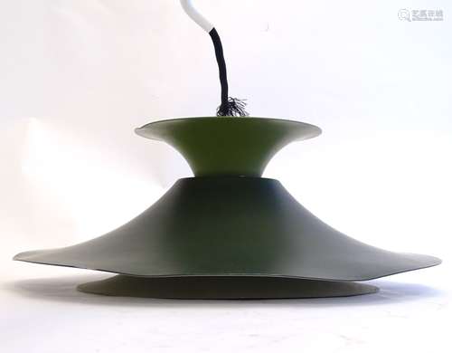 A vintage retro pendant light, in dark green and lime finish with white interior,