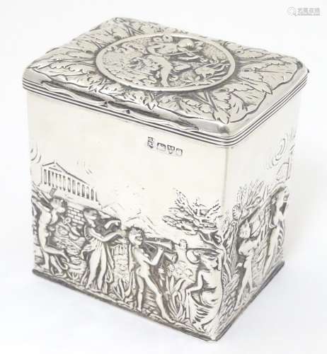 A silver caddy / hinged lidded box decorated with figures, centaur,