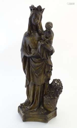 A 20thC composite sculpture of the Madonna and Child,