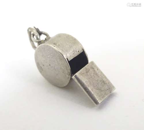 A novelty silver pendant charm formed as a whistle. Approx. 1/2