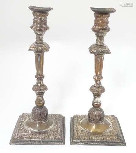 A pair of 19thC Old Sheffield plate candlesticks 11