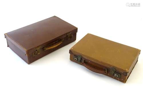 A leather attache case of rectangular form, marked Real Cowhide. Together with another.