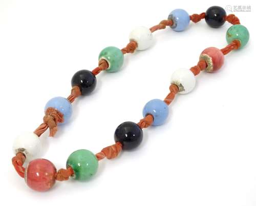 A vintage necklace of ceramic beads.