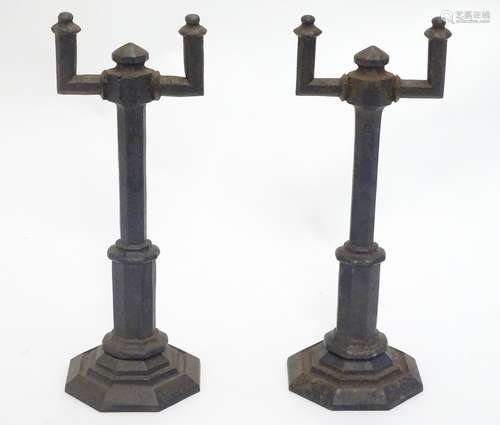 A Victorian pair of cast iron firedogs / fire tool stands,