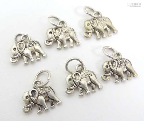 6 novelty white metal pendant charms formed as elephant.