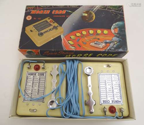 Toy: A 20thC Space Station Morse Code signalling set toy, no. 107. In original box. Box approx.