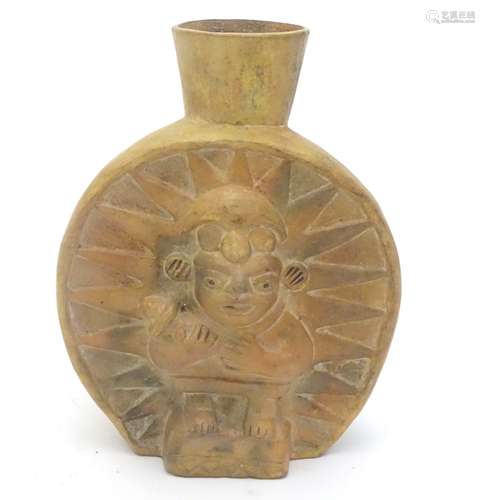 A tribal terracotta stylised moon flask with a flat front, bulbous back and flared rim,