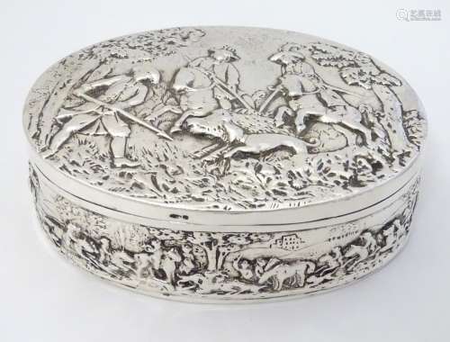 Continental silver table box of oval form profusely decorated with various Continental hunting
