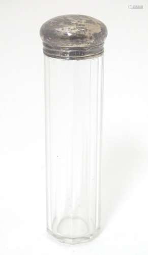 A glass dressing table jar with silver top hallmarked London 1905 maker Percy Whitehouse 5 1/4