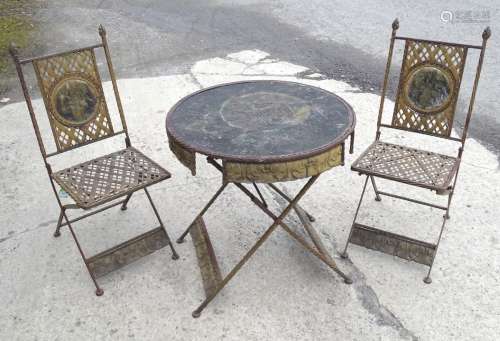 A German garden bistro set, comprising circular table and two chairs,