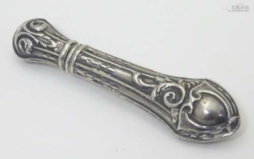 A silver needle case with embossed decoration by Ari D Norman.