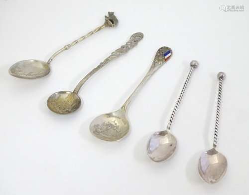 Assorted silver and white metal spoons including a commemorative spoon depicting Congress Hall to