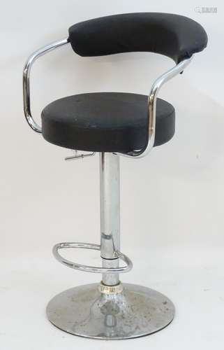 A late 20thC adjustable swivel seat with an upholstered curved backrest and rounded seat,