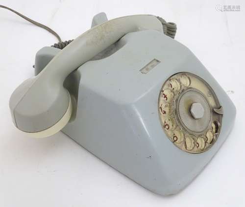 A 20thC West German desk telephone, marked 'TN' (Telefonbau Normalzeit), in sky blue finish,