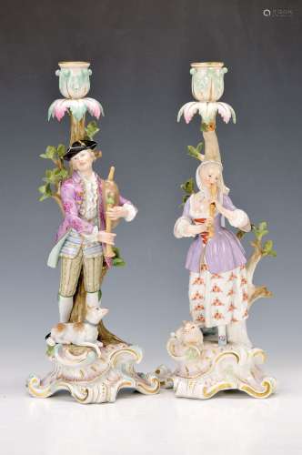 pair of candlesticks with figurines