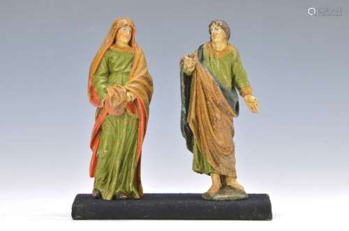 2 sculptures of saints