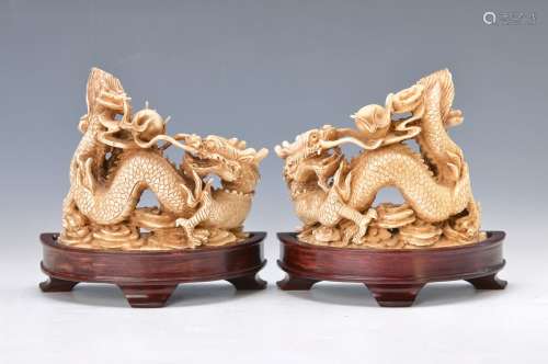 2 carvings of wind dragons