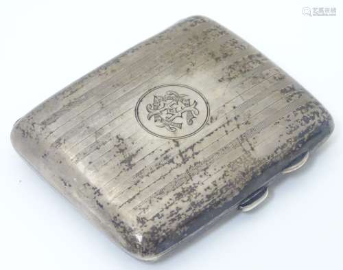 An Art Deco silver cigarette case with engine turned banded decoration, hallmarked Birmingham 1920,