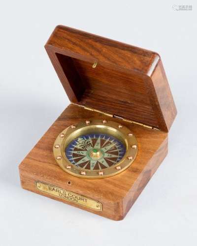 Earls Court Compass, in wooden casket. 7x7cm