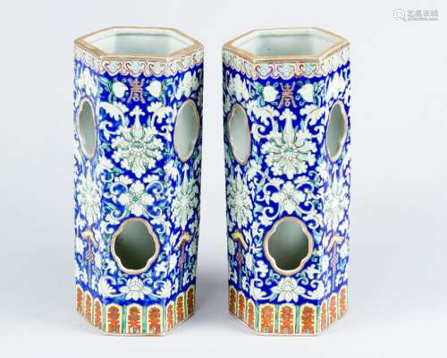 Pair of Chinese vases, canted shape with oval wind…