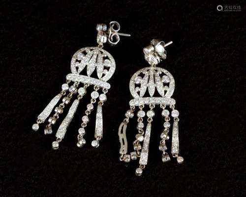 Platinum diamond earrings, around 1930, flexible m…