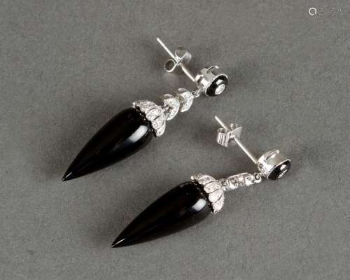 Onyx diamond earrings around 1940, flexible mounte…