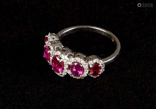 Diamond ruby ring around 1960, with 5 rubies about…