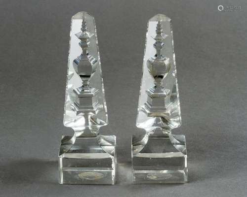 Two glass obeliscs, transparent glass with cutted …