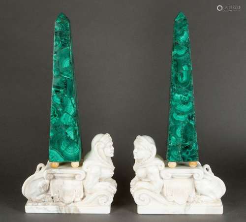 Pair of malachite obeliscs, each standing on four …