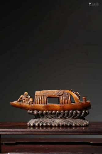 A Carved Bamboo Boat