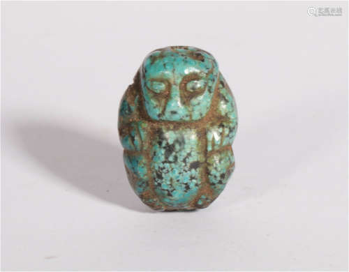 A Carved Turquoise Bead Tang Dynasty