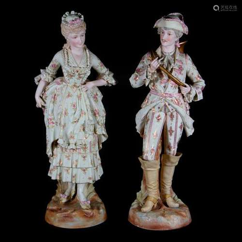 A pair of bisque figures.