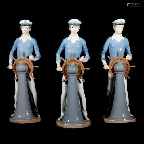 Three Lladro porcelain sailors.