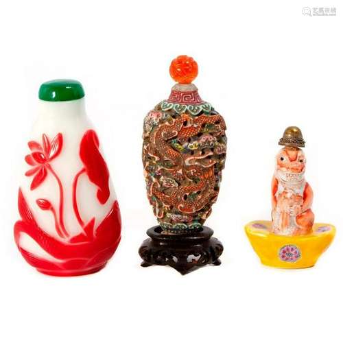 Three Chinese snuff bottles.